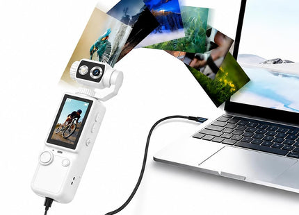 Λευκή Q8 κάμερα συνδεδεμένη με καλώδιο USB σε φορητό υπολογιστή για μεταφορά αρχείων